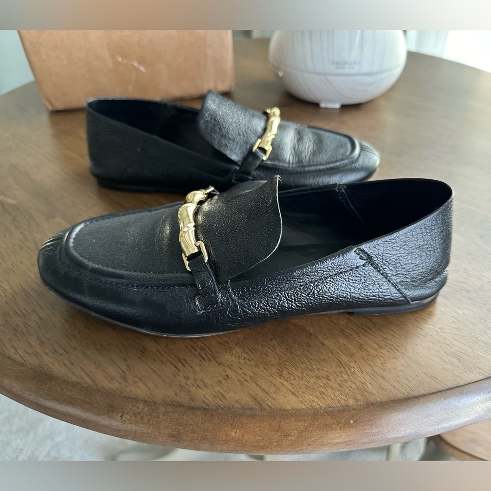 Black leather Vince camuto loafers with gold accent